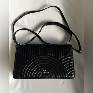 Coach crossbody bag with leather strap and chain style strap